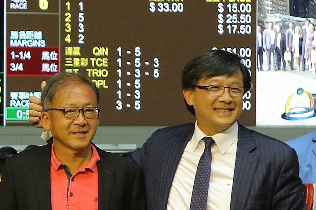 Junius Ho (right) celebrates Hong Kong Bet’s win at Happy Valley in July. Photos: Kenneth Chan