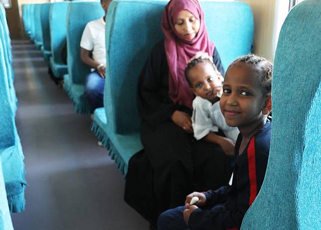 Passengers sit on a train at the Nagad railway station along the Ethiopia-Djibouti railway in Djibouti, Sept. 19, 2022. (Xinhua/Dong Jianghui)