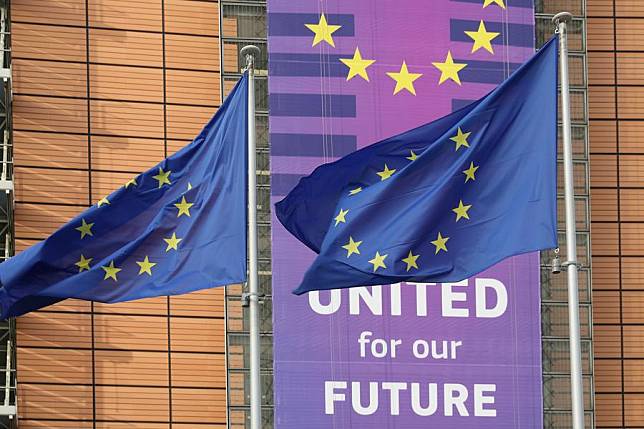 Flags of the European Union fly outside the Berlaymont Building, the European Commission headquarters, in Brussels, Belgium, Jan. 29, 2025. (Xinhua/Meng Dingbo)