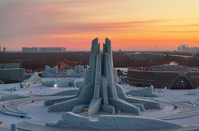 An aerial drone photo taken in the early morning of Feb. 26, 2025 shows a view of the Harbin Ice-Snow World in Harbin, northeast China's Heilongjiang Province. (Photo by Zhang Shu/Xinhua)