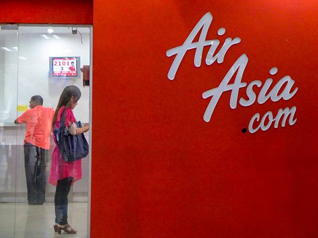 People is seen at Air Asia center at Kuala Lumpur.Kuala