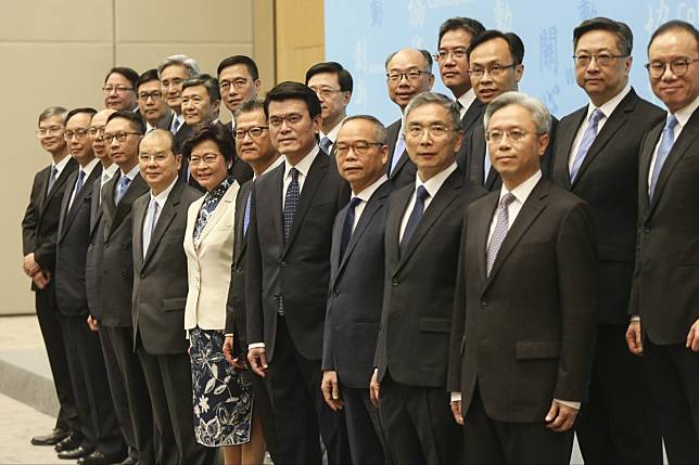Chief Executive Carrie Lam Cheng (front row centre) and her cabinet. Photo: Xiaomei Chen