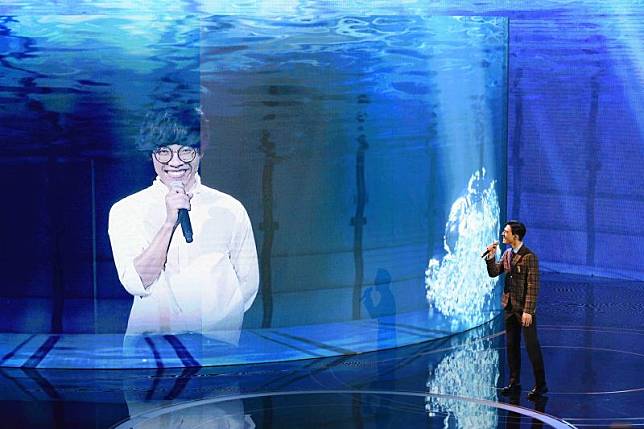 盧廣仲遠端合體陳昊森演唱電影主題曲《刻在我心底的名字》。（圖／台視提供）
