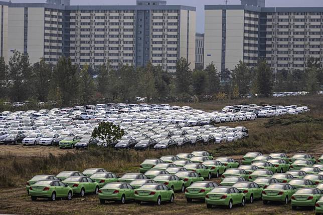 Cars stand ready for delivery at BYD’s electric car factory in Xian, Shaanxi province. Sales of new-energy vehicles fell 42 per cent to 78,000 units last month. Photo: EPA-EFE