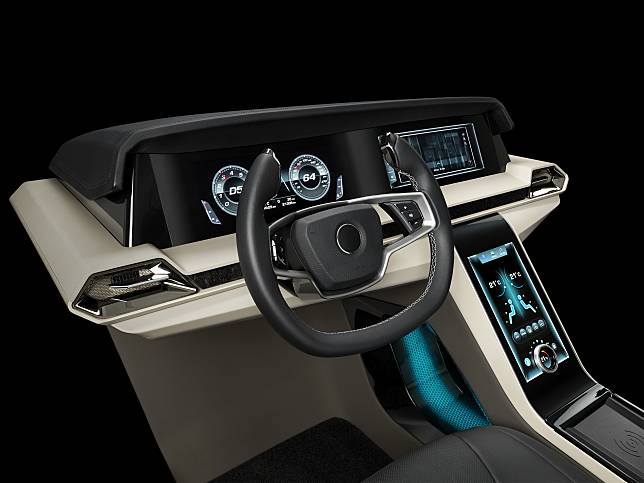 Drivers side view of futuristic car interior designed by Corning and it’s use of Gorilla Glass technologies in touchscreen displays.