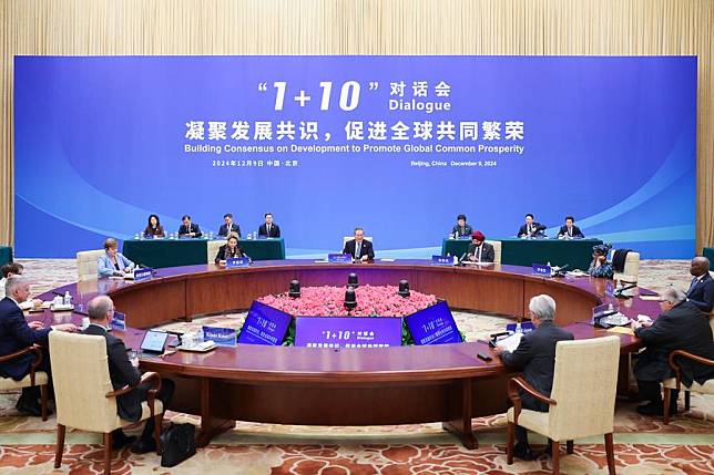 Chinese Premier Li Qiang holds the &ldquo;1+10&rdquo; dialogue with heads of 10 international economic organizations, including President of the New Development Bank Dilma Rousseff, President of the World Bank Group Ajay Banga, Managing Director of the International Monetary Fund Kristalina Georgieva, Director-General of the World Trade Organization Ngozi Okonjo-Iweala, Secretary-General of UN Conference on Trade and Development Rebeca Grynspan, Director-General of the International Labor Organization Gilbert Houngbo, Secretary-General of the Organization for Economic Cooperation and Development Mathias Cormann, General Manager of the Bank for International Settlements Agustin Carstens, Chair of the Financial Stability Board Klaas Knot, and President of the Asian Infrastructure Investment Bank Jin Liqun, at the Diaoyutai State Guesthouse in Beijing, capital of China, Dec. 9, 2024. (Xinhua/Liu Bin)