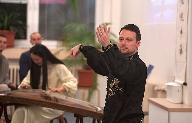 A man demonstrates traditional Chinese exercise Tai Chi during an event on traditional Chinese medicine (TCM) in Prague, the Czech Republic, on Nov. 28, 2024. (Photo by Dana Kesnerova/Xinhua)