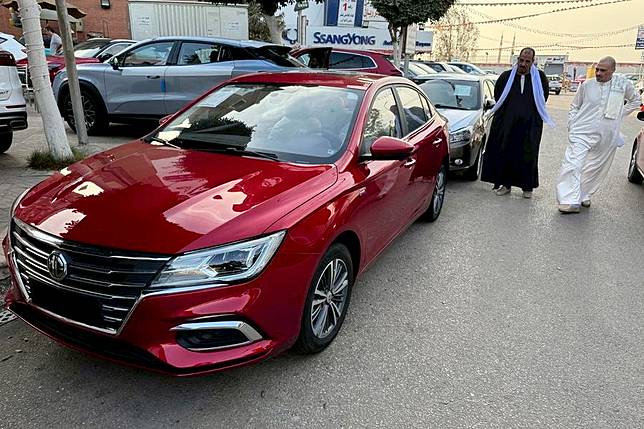 People view a Chinese car at a car dealership in Cairo, Egypt, March 28, 2025. (Xinhua/Ahmed Gomaa)