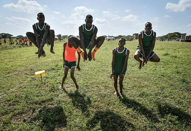 Maasai participants warm up before the Maasai games in Kajiado County, Kenya, on Dec. 14, 2024. (Xinhua/Han Xu)