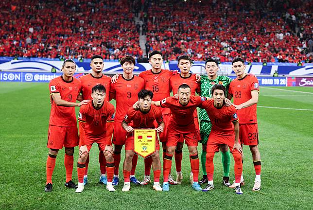 Starting players of China line up before the 2026 FIFA World Cup Asian Qualifiers Group C match between China and Indonesia in Qingdao, east China's Shandong Province, Oct. 15, 2024. (Xinhua/Jia Haocheng)