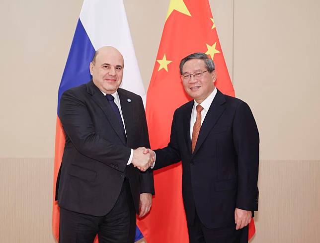 Chinese Premier Li Qiang meets with Russian Prime Minister Mikhail Mishustin on the sidelines of the 23rd Meeting of the Council of Heads of Government of Member States of the Shanghai Cooperation Organization in Islamabad, Pakistan, Oct. 16, 2024. (Xinhua/Ding Haitao)