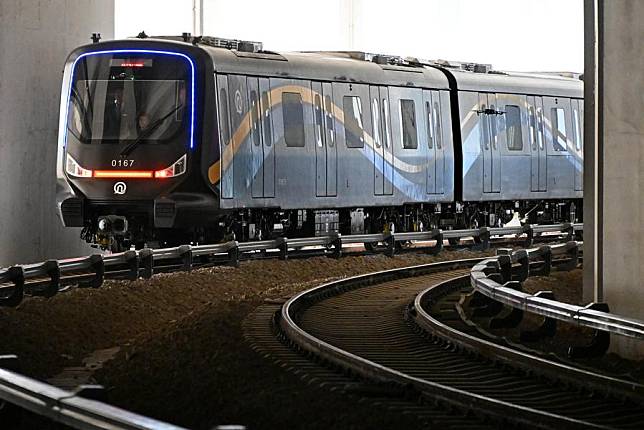 A CETROVO 1.0 metro train leaves a parking lot before its operation in Qingdao, east China's Shandong Province, Jan. 10, 2025. (Xinhua/Li Ziheng)