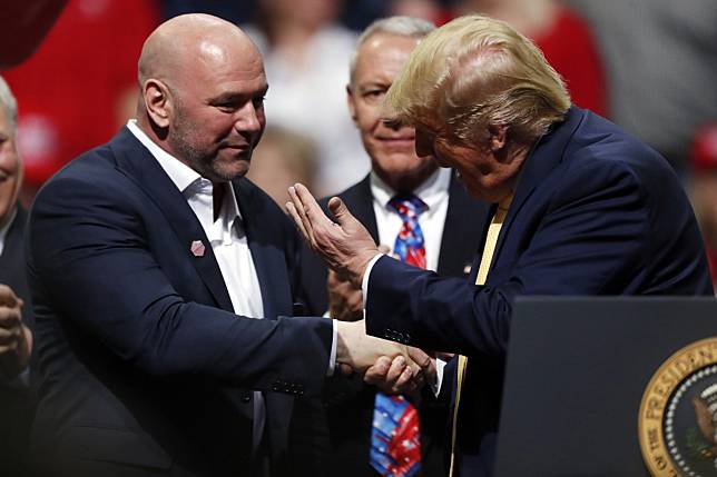 US President Donald Trump greets Dana White, head of the UFC, at a campaign rally in Colorado Springs. Photo: AP Photo