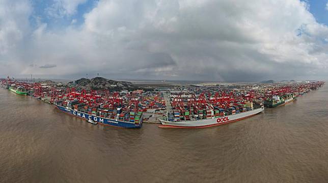 An aerial drone photo shows a panoramic view of Yangshan Port of Shanghai Port, east China, Dec. 18, 2024. (Xinhua/Fang Zhe)