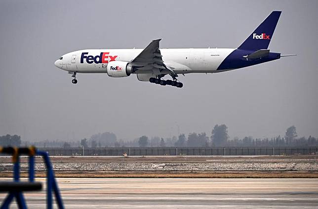 A FedEx cargo flight arrives at Qingdao Jiaodong International Airport in Qingdao, east China's Shandong Province, Nov. 11, 2024. (Xinhua/Li Ziheng)