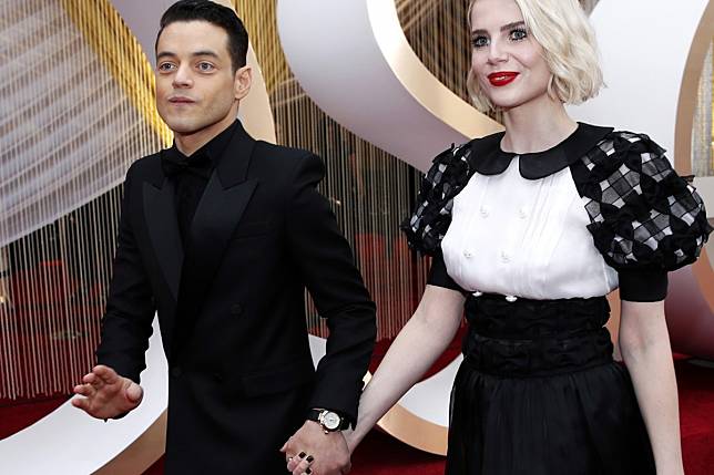 Rami Malek rocks a vintage Pasha de Cartier watch, with Lucy Boynton, on the red carpet during the Oscars arrivals at the 92nd Academy Awards in Hollywood. Photo: Mike Blake