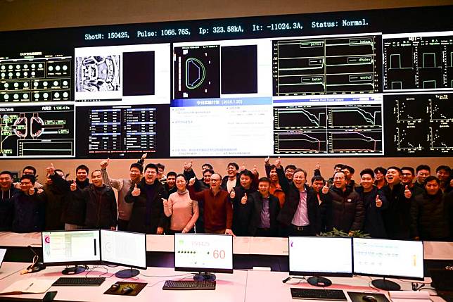 Members of division of the Experimental Advanced Superconducting Tokamak (EAST) Physics and Experimental Operations celebrate the success of an experiment in Hefei, east China's Anhui Province, Jan. 20, 2025. (Xinhua/Zhou Mu)