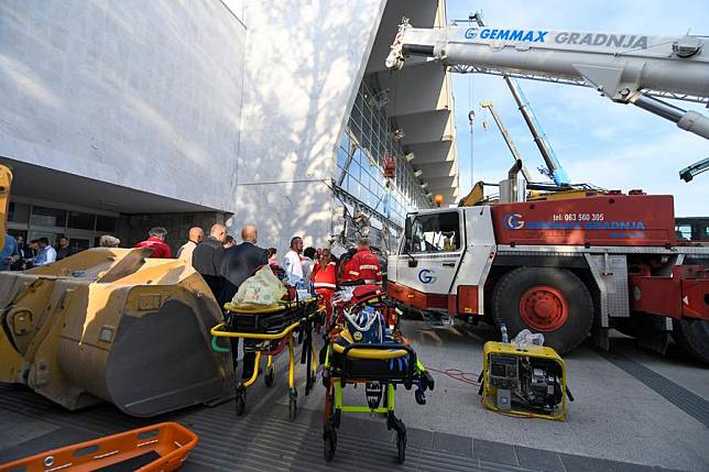 Emergency personnel work at the site where a concrete platform roof of a train station collapsed in Novi Sad, Serbia, on Nov. 1, 2024. (Photo by Predrag Milosavljevic/Xinhua)