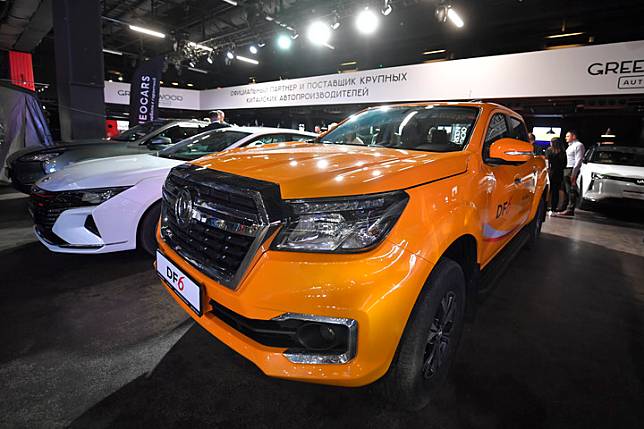 A vehicle from Chinese car brand Dongfeng Motor stands on display during the CarX exhibition-forum in Moscow, Russia, on Oct. 10, 2023. (Photo by Alexander Zemlianichenko Jr/Xinhua)