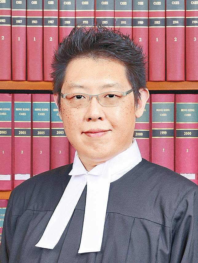 裁判官林希維.。