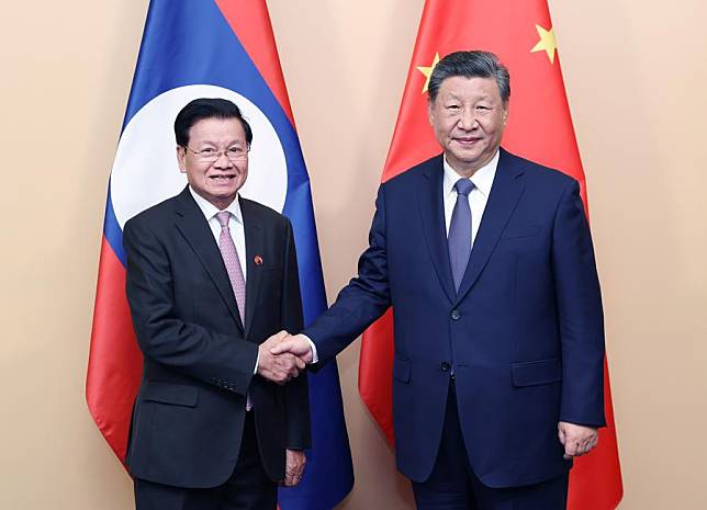 Chinese President Xi Jinping meets with Thongloun Sisoulith, general secretary of the Lao People's Revolutionary Party Central Committee and Lao president, in Kazan, Russia, Oct. 22, 2024. (Xinhua/Yao Dawei)