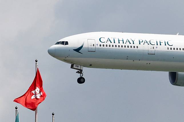 A Cathay Pacific plane lands at Hong Kong airport on August 14 after it reopened after clashes between police and protesters. Photo: Reuters