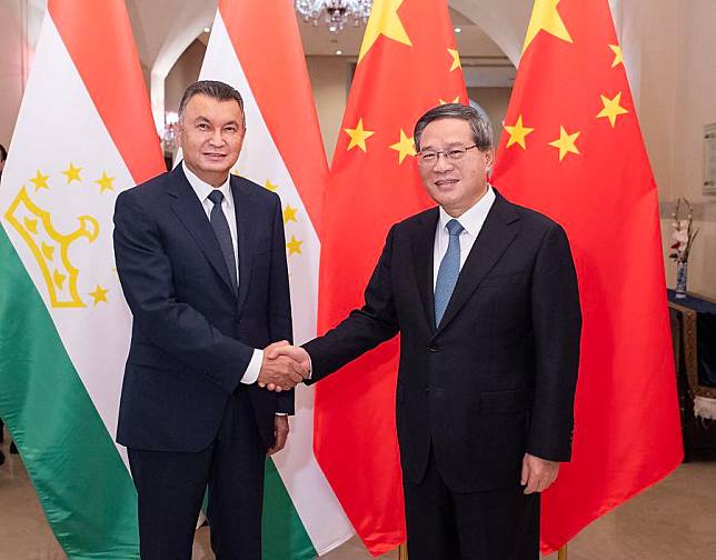 Chinese Premier Li Qiang meets with Tajik Prime Minister Kokhir Rasulzoda on the sidelines of the 23rd Meeting of the Council of Heads of Government of Member States of the Shanghai Cooperation Organization in Islamabad, Pakistan, Oct. 15, 2024. (Xinhua/Li Tao)