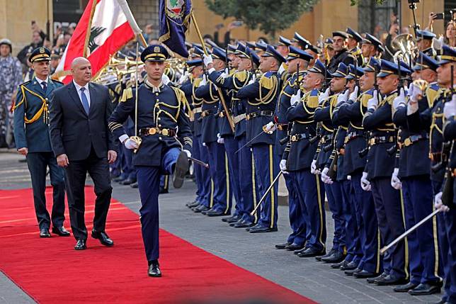 Joseph Aoun (2nd L) reviews the guard of honor after he was sworn in as Lebanon's president in Beirut, Lebanon, Jan. 9, 2025. (Xinhua/Bilal Jawich)