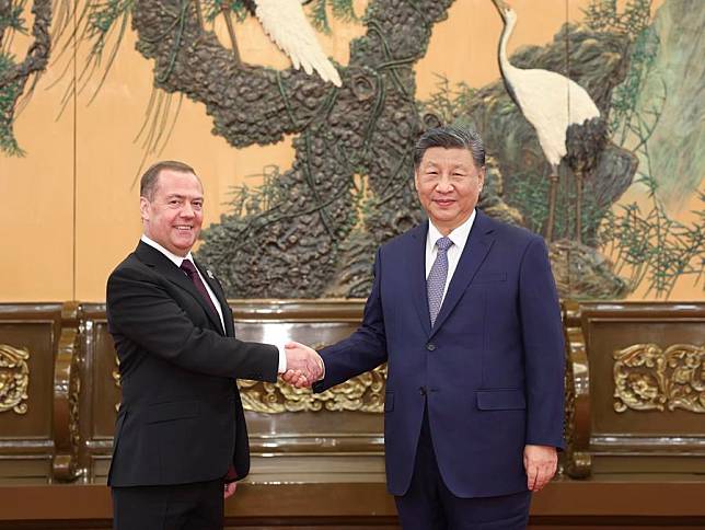 Xi Jinping, general secretary of the Communist Party of China Central Committee and Chinese president, meets with Chairman of the United Russia party Dmitry Medvedev at the Great Hall of the People in Beijing, capital of China, Dec. 12, 2024. (Xinhua/Ding Haitao)