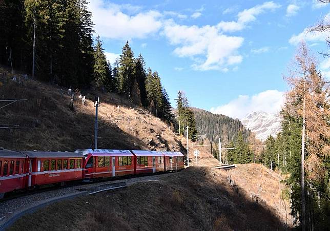 A train runs on the Albula-Bernina railway in Switzerland, Dec. 3, 2024. (Xinhua/Lian Yi)