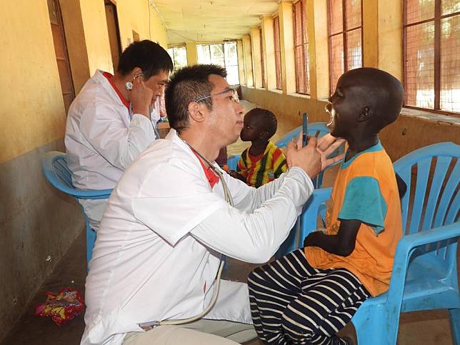 Doctors from the 12th Chinese medical team examines a child at the Juba Orphanage in Juba, South Sudan, Sept. 28, 2024. (Photo by Denis Elamu/Xinhua)