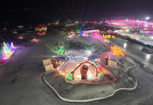 An aerial drone photo taken on Jan. 12, 2025 shows the night view of the rice paddy theme park in Shenyang, northeast China's Liaoning Province. (Xinhua/Li Gang)