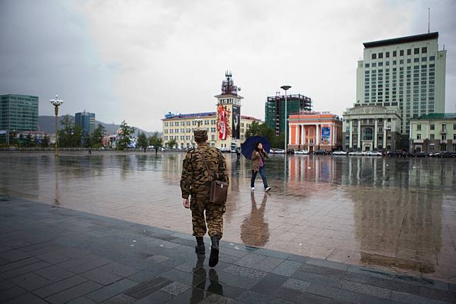 Sukhbaatar Square in the Mongolian capital, Ulan Bator. Several Soviet-era buildings surrounding the square are slated for demolition. Residents of the capital city are fighting the plans. Photo: Alamy.