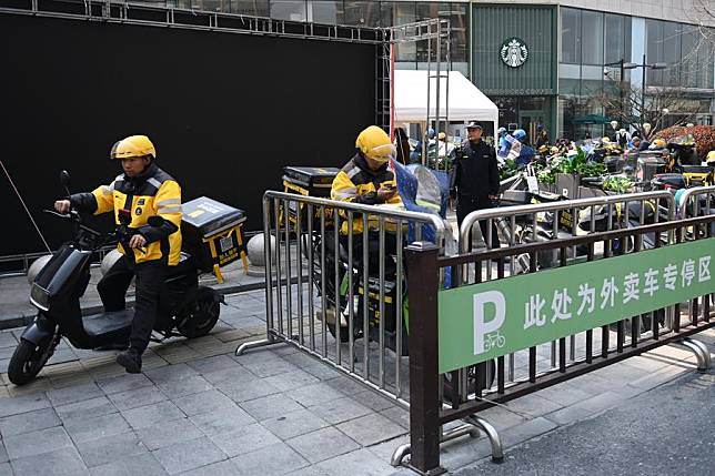 This photo shows the parking space for takeaway-delivery electric motorcycles in Gongshu District of Hangzhou, east China's Zhejiang Province, March 15, 2024. (Xinhua/Huang Zongzhi)