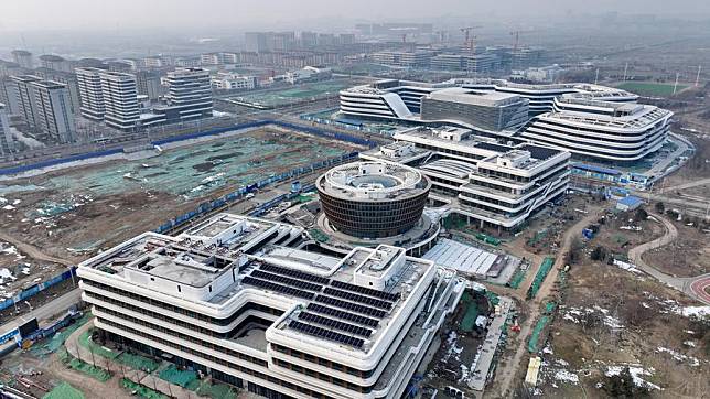 An aerial drone photo taken on Feb. 6, 2024 shows the construction site of the China Telecom smart city industrial park in Xiong'an New Area, north China's Hebei Province. (Xinhua/Mu Yu)