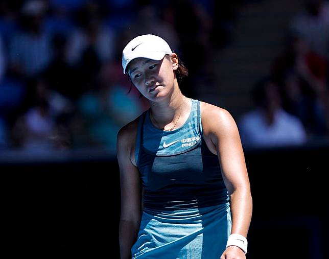 Wang Xiyu of China reacts during the women's singles second round match against Emma Navarro of the United States at the Australian Open in Melbourne, Australia, on Jan. 16, 2025. (Xinhua/Ma Ping)