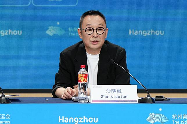 Sha Xiaolan, chief director of the Hangzhou Asian Games opening ceremony, speaks at a press conference on preparations for the opening ceremony in Hangzhou, east China's Zhejiang Province, on Sept. 21, 2023. (Xinhua/Li Yibo)