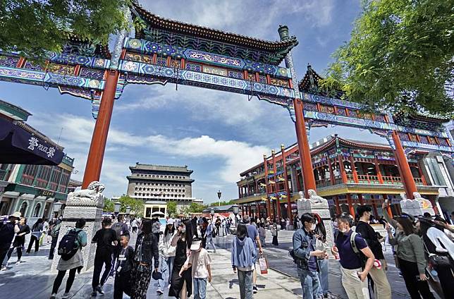 Tourists visit the Qianmen commercial district in Beijing, capital of China, May 1, 2024. (Xinhua/Li Xin)