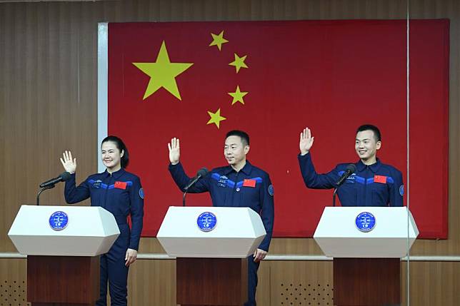 Chinese astronauts Cai Xuzhe &copy;, Song Lingdong &reg; and Wang Haoze, who will carry out the Shenzhou-19 spaceflight mission, meet the press at the Jiuquan Satellite Launch Center in northwest China, Oct. 29, 2024. (Xinhua/Li Zhipeng)