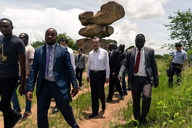 Wang Yi visits the Epworth Balancing Rocks national park in Harare. Photo: AFP