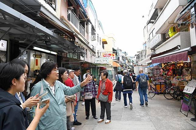 A group of descendants of Hong Kong wartime veterans visited the old site of the fish market in Cheung Chau, Hong Kong, south China, on Nov. 15, 2024. (Xinhua/Chen Duo)