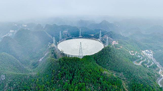 An aerial drone photo taken on Feb. 18, 2025 shows China's Five-hundred-meter Aperture Spherical Radio Telescope (FAST) under maintenance in southwest China's Guizhou Province. (Xinhua/Ou Dongqu)