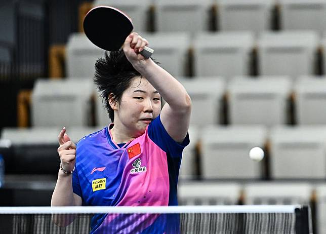 Kuai Man hits a return during the women's final against Kihara Miyuu of Japan at the WTT Star Contender Doha 2025 in Doha, Qatar, Jan. 11, 2025. (Photo by Nikku/Xinhua)