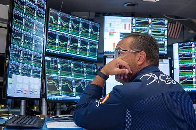 A trader works on the trading floor of the New York Stock Exchange (NYSE) in New York, the United States, on Aug. 5, 2024. (Photo by Michael Nagle/Xinhua)