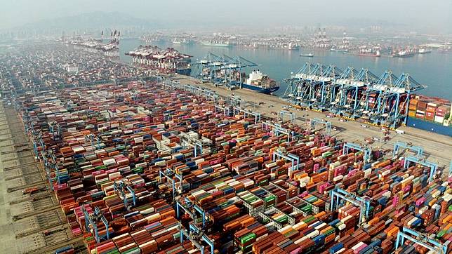 An aerial drone photo shows the Qingdao Port in east China's Shandong Province, Feb. 11, 2024. (Xinhua/Li Ziheng)