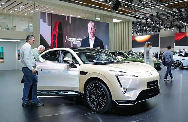 People visit the booth of AVATR at the Automechanika in Frankfurt, Germany, Sept. 11, 2024. (Xinhua/Zhang Fan)