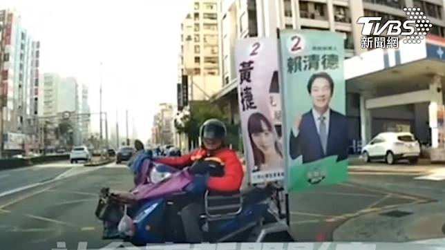 男子騎著身障三輪機車，憤怒質問女駕駛為何逼車。（圖／社會事新聞影音）