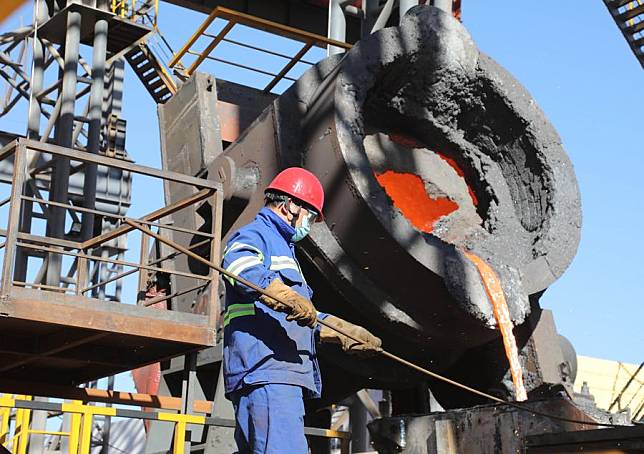 A worker is busy at the Dinson Iron and Steel Company (DISCO) in Manhize, Midlands Province, Zimbabwe, June 20, 2024. (Photo by Shaun Jusa/Xinhua)