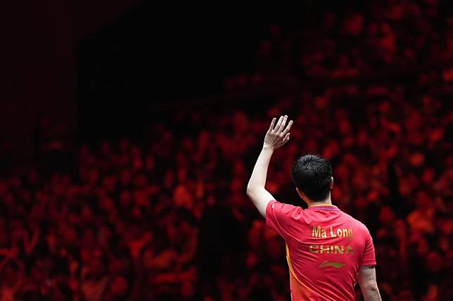 Ma Long of China greets spectators after his men's singles final against his compatriot Lin Shidong at the 2024 World Table Tennis (WTT) China Smash in Beijing on Oct. 6, 2024. (Xinhua/Ju Huanzong)