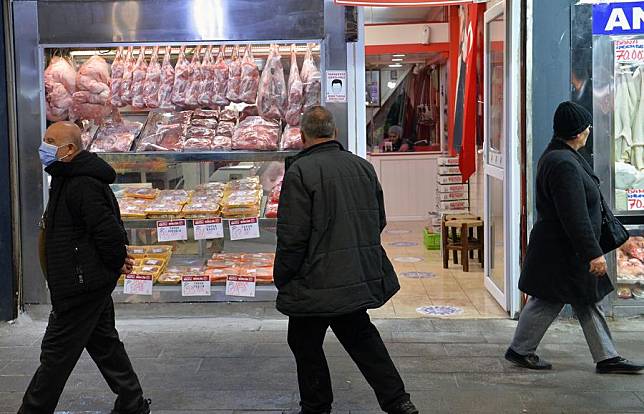 People walk past a local market in Ankara, Türkiye, on Jan. 15, 2025. (Mustafa Kaya/Handout via Xinhua)